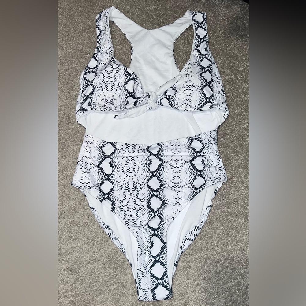 Never worn one piece bathing suit